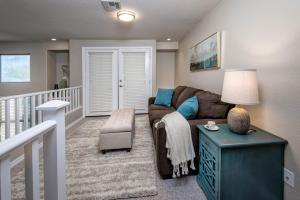 a living room with a couch and a table at Clubgate Villa & Kierland Escape in Scottsdale