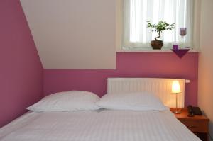Posteľ alebo postele v izbe v ubytovaní Hotel Vistula