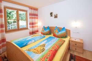 Postel nebo postele na pokoji v ubytování Haus Thomas