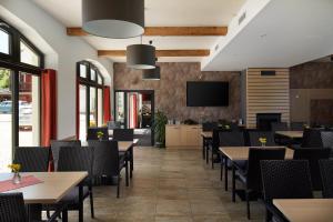 Reštaurácia alebo iné gastronomické zariadenie v ubytovaní JBX Resort Hotel Albatros