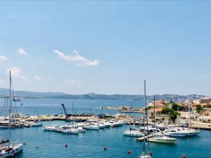a bunch of boats are docked in a harbor at La Siesta in La Maddalena