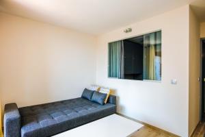 Ein Bett oder Betten in einem Zimmer der Unterkunft Monaco View Apartment
