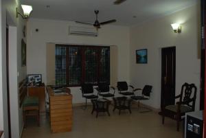 TV a/nebo společenská místnost v ubytování Elim Homestay Fort Kochi