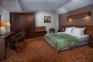 Tempat tidur dalam kamar di Hotel Otrada