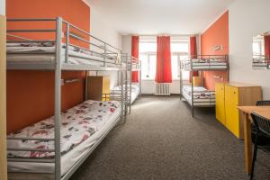 
A bunk bed or bunk beds in a room at Hostel Advantage
