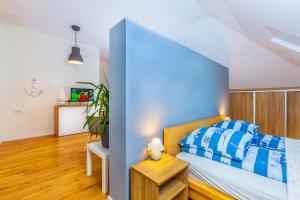 Posteľ alebo postele v izbe v ubytovaní Apartament nad Zatoką