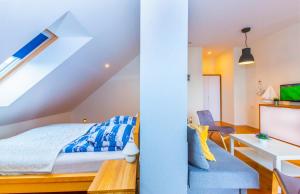 Posteľ alebo postele v izbe v ubytovaní Apartament nad Zatoką