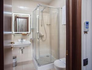 Ванна кімната в Hotel Otrada