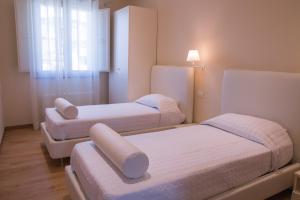 Postel nebo postele na pokoji v ubytování B&B SILVIA + 22 fotografií