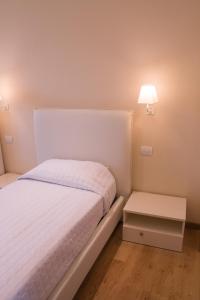 Postel nebo postele na pokoji v ubytování B&B SILVIA