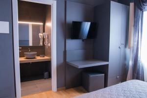 Postel nebo postele na pokoji v ubytování B&B SILVIA