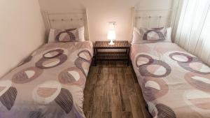 A bed or beds in a room at Apartamento Nuevo con Encanto