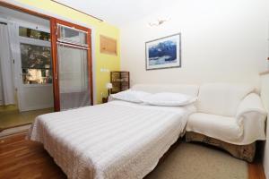 Posteľ alebo postele v izbe v ubytovaní Studio Kotiska Makarska