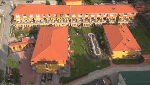 an overhead view of a building with an orange roof at Zempin Ostseepark WE 36 _Insel Use in Zempin
