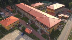 an overhead view of a building with an orange roof at Zempin Ostseepark WE 36 _Insel Use in Zempin