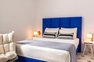 Llit o llits en una habitació de Damma Beachfront Luxury Villa