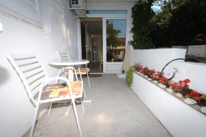Patio alebo iná vonkajšia časť ubytovania Studio Kotiska Makarska