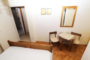 Posteľ alebo postele v izbe v ubytovaní Studio Kotiska Makarska