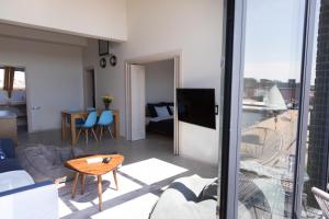 Telewizja i/lub zestaw kina domowego w obiekcie Apartamenty Port Ustka