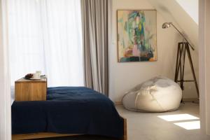 Łóżko lub łóżka w pokoju w obiekcie Apartamenty Port Ustka