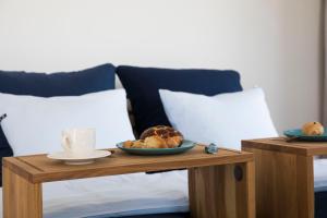 Łóżko lub łóżka w pokoju w obiekcie Apartamenty Port Ustka