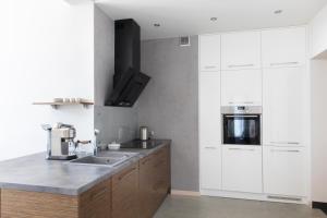 Kuchnia lub aneks kuchenny w obiekcie Apartamenty Port Ustka