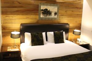 Кровать или кровати в номере Rangi Pucon