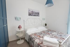 Postel nebo postele na pokoji v ubytování Casa cielo&mare