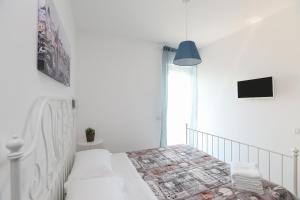 Postel nebo postele na pokoji v ubytování Casa cielo&mare