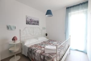 Postel nebo postele na pokoji v ubytování Casa cielo&mare