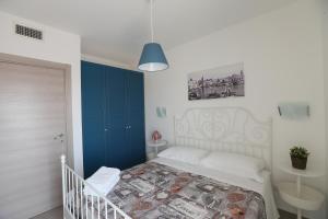 Postel nebo postele na pokoji v ubytování Casa cielo&mare