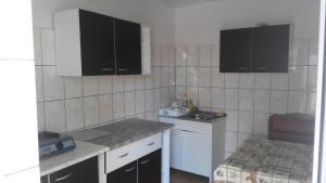 Kuchyň nebo kuchyňský kout v ubytování vila CALIL