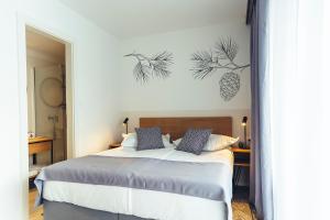 Postel nebo postele na pokoji v ubytování MORENIA All Inclusive Hotel