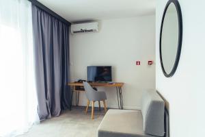 TV a/nebo společenská místnost v ubytování MORENIA All Inclusive Hotel
