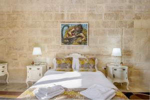 Una cama o camas en una habitación de Point de vue Guesthouse
