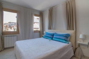 Katil atau katil-katil dalam bilik di Fisherman's House Tipica casa a Chioggia