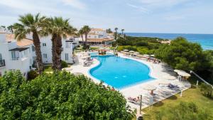 an image of a swimming pool at a resort at Grupotel Aldea Cala'n Bosch in Cala'n Bosch