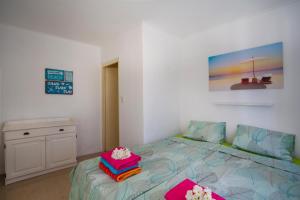 Cama ou camas em um quarto em Villa Cle - Curaçao