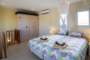 Katil atau katil-katil dalam bilik di Villa Cle - Curaçao