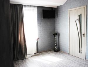 TV a/nebo společenská místnost v ubytování Golden Way