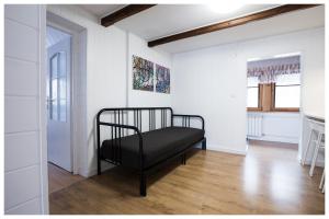 Posteľ alebo postele v izbe v ubytovaní Apartamenty Góralski DACH NAD GŁOWĄ