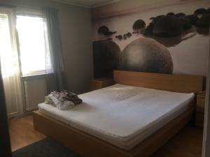 Säng eller sängar i ett rum på Villa Aspedalsgatan