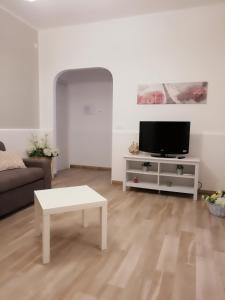 TV a/nebo společenská místnost v ubytování Casa Simo