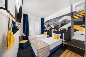 Voodi või voodid majutusasutuse D8 Hotel toas