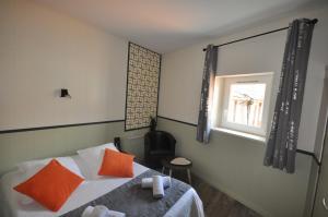 Un ou plusieurs lits dans un hébergement de l'établissement Hotel Cote Basque