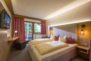 Letto o letti in una camera di La Pasta Hotel Restaurant
