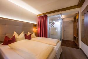 Letto o letti in una camera di La Pasta Hotel Restaurant