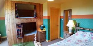 Postel nebo postele na pokoji v ubytování Herrislea House Hotel