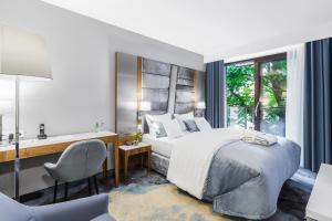 Postel nebo postele na pokoji v ubytování Hotel Testa