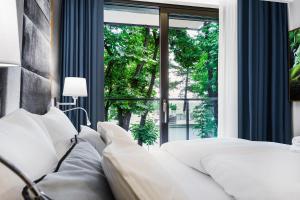 Postel nebo postele na pokoji v ubytování Hotel Testa